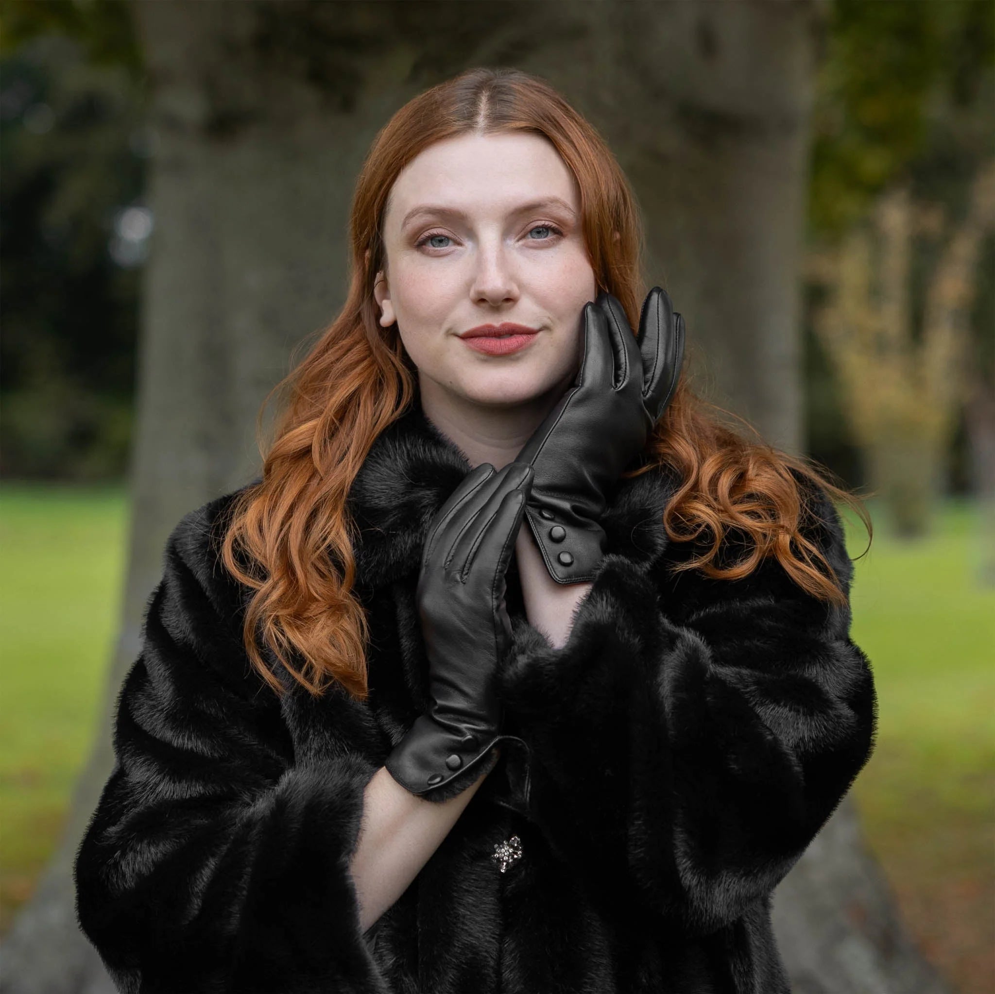 Women’s Touchscreen Water-Resistant Leather Gloves with Faux Fur Lining and Button Detail